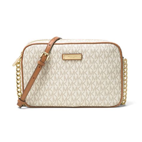 michael kors jet set crossbody small vanilla|Michael Kors jet set pouch.